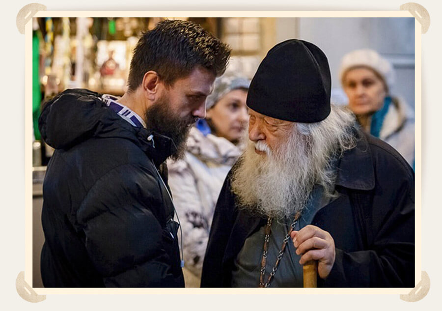 священник 