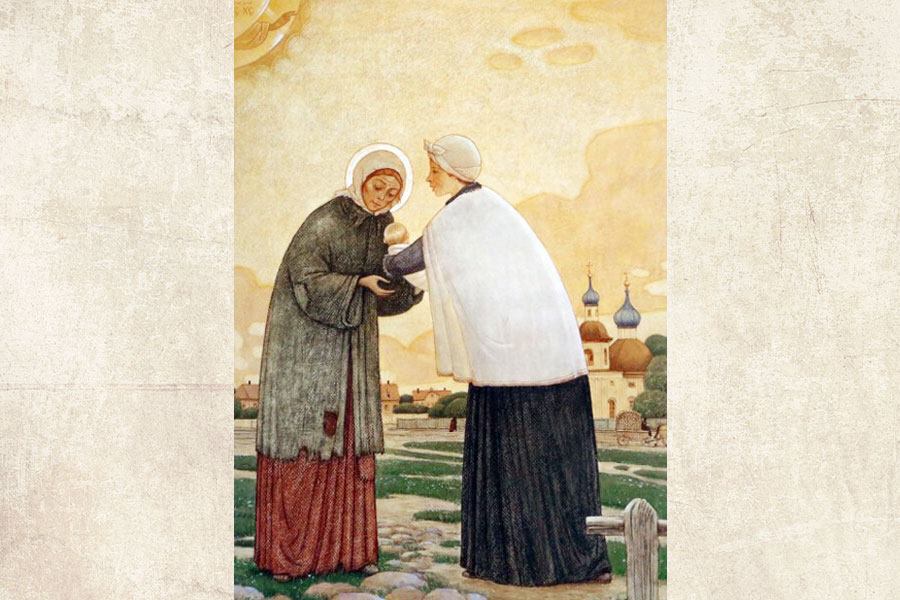 святая принимает ребенка на руки