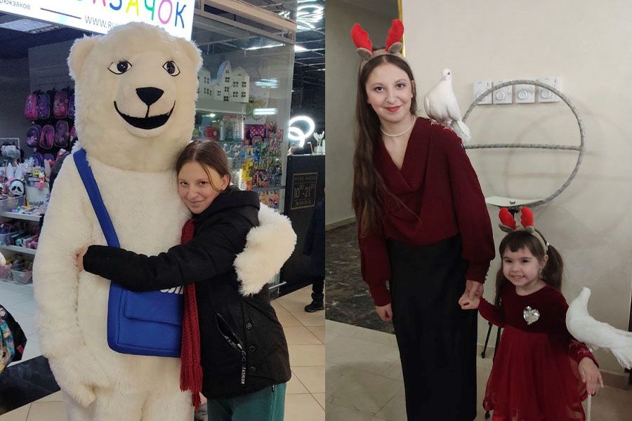 девочка обнимает плюшевого медведя