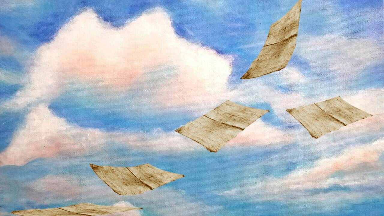 листы бумаги в небе